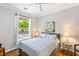 Cozy bedroom with a large window, soft lighting, and neutral-colored walls at 1600 Long Grove Dr # 1115, Mount Pleasant, SC 29464