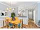 Bright dining room with stylish furnishings, seamlessly connected to the kitchen and living area at 1600 Long Grove Dr # 1115, Mount Pleasant, SC 29464