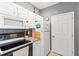 Efficient kitchen with white cabinets, granite countertops, and modern appliances at 1600 Long Grove Dr # 1115, Mount Pleasant, SC 29464
