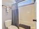 Bathroom featuring a shower/tub combo with a stylish blue and gray shower curtain at 173 Silver Cypress Cir, Summerville, SC 29485
