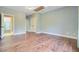 Spacious room featuring wood floors, neutral walls, and ample natural light, perfect for relaxation or productivity at 173 Silver Cypress Cir, Summerville, SC 29485