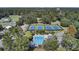 Aerial view of tennis courts, pool, and putting green offering a variety of recreational activities at 173 Silver Cypress Cir, Summerville, SC 29485
