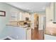 Bright kitchen with stone countertops, stainless appliances and modern fixtures at 173 Silver Cypress Cir, Summerville, SC 29485