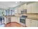 Well-lit kitchen featuring stainless steel appliances and granite countertops at 173 Silver Cypress Cir, Summerville, SC 29485