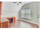 Bright home office area with wood floors, desk, and natural light streaming through the window at 173 Silver Cypress Cir, Summerville, SC 29485