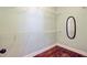 This is an empty walk-in closet with white wire shelving and a full-length mirror for convenience at 173 Silver Cypress Cir, Summerville, SC 29485