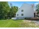Spacious backyard featuring lush green grass and the side exterior view of the home at 190 Darcy Ave, Goose Creek, SC 29445