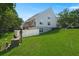 Lush green backyard featuring the rear exterior view of the property with a deck and a privacy fence at 190 Darcy Ave, Goose Creek, SC 29445