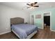 Bedroom features hardwood floors, a ceiling fan, and a queen bed at 190 Darcy Ave, Goose Creek, SC 29445