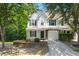 Charming two-story townhome featuring a well-manicured front yard and an attached one-car garage at 190 Darcy Ave, Goose Creek, SC 29445