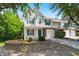 Charming two-story townhome featuring a well-manicured front yard and an attached one-car garage at 190 Darcy Ave, Goose Creek, SC 29445