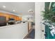 Open concept kitchen featuring wood cabinets, stainless steel appliances, and views of the living area at 190 Darcy Ave, Goose Creek, SC 29445