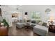 Bright, open living area with hardwood floors, comfortable seating, and ample natural light at 190 Darcy Ave, Goose Creek, SC 29445