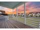 Balcony view overlooking neighborhood streets and manicured lawns at sunset at 203 Symphony Ave, Summerville, SC 29486