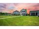 Picture-perfect home with a double porch and lush green lawn at 203 Symphony Ave, Summerville, SC 29486