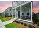 Cozy front porch with seating, plants, and stylish decor at 203 Symphony Ave, Summerville, SC 29486