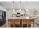 Modern kitchen boasts granite countertops, stainless steel appliances, and a spacious island at 203 Symphony Ave, Summerville, SC 29486