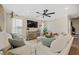 Comfortable living room features soft textures, neutral colors, a large television, and modern decor at 203 Symphony Ave, Summerville, SC 29486