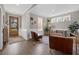 Comfortable living room area with hardwood floors and natural light, creating a warm ambiance at 203 Symphony Ave, Summerville, SC 29486