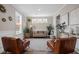 Cozy living room with a modern rug, comfortable seating, and stylish decor at 203 Symphony Ave, Summerville, SC 29486