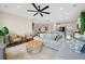 Bright living room featuring stylish furnishings, decor, and an open floor plan leading to the kitchen at 203 Symphony Ave, Summerville, SC 29486