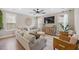 Comfortable living room features soft textures, neutral colors, a large television, and modern decor at 203 Symphony Ave, Summerville, SC 29486