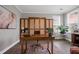 Cozy home office with a built-in Murphy bed and a stylish wooden desk at 203 Symphony Ave, Summerville, SC 29486