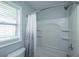 Standard tub and shower combination with built in shelves, a white shower curtain and a window at 204 Foxborough Rd, Goose Creek, SC 29445