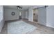 Living room features hardwood floors, neutral walls, an area rug and a sliding barn door at 204 Foxborough Rd, Goose Creek, SC 29445