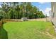 Spacious backyard with a shed surrounded by trees at 217 Black Tupelo Ct, Moncks Corner, SC 29461