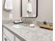 Bathroom vanity features gray counters and modern faucet and sink at 2226 Arthur Rose Ln, Johns Island, SC 29455
