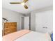Neutral bedroom with ceiling fan, white double door closet and wood dresser at 2226 Arthur Rose Ln, Johns Island, SC 29455