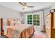Bedroom featuring large window and wood furniture at 2226 Arthur Rose Ln, Johns Island, SC 29455