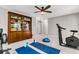 Bright bonus room with built-in storage, exercise equipment, and soft gray carpeting at 2226 Arthur Rose Ln, Johns Island, SC 29455
