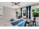 Inviting bonus room with bright windows and fitness equipment at 2226 Arthur Rose Ln, Johns Island, SC 29455