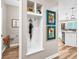 Entryway showcasing built-in cubbies and modern decor leading into the bright kitchen at 2226 Arthur Rose Ln, Johns Island, SC 29455