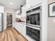 Well-equipped kitchen showcasing modern appliances, a pantry, granite countertops, and ample cabinet space at 2226 Arthur Rose Ln, Johns Island, SC 29455