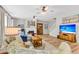 Bright living room featuring a fireplace, hardwood floors, and comfortable seating at 2226 Arthur Rose Ln, Johns Island, SC 29455