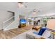 Open floor plan showcasing the living room, kitchen, staircase, and modern interior design at 2226 Arthur Rose Ln, Johns Island, SC 29455