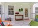 Charming patio with cozy furniture, decorations and accents, perfect for outdoor relaxing at 2226 Arthur Rose Ln, Johns Island, SC 29455