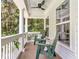Cozy porch setting with comfortable seating and lush outdoor views at 2226 Arthur Rose Ln, Johns Island, SC 29455