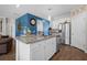 Spacious kitchen with granite countertops, white cabinets, and stainless steel appliances at 225 N Light Way, Summerville, SC 29486