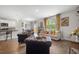 Spacious open concept living area featuring hardwood floors, modern design, and abundant natural light at 225 N Light Way, Summerville, SC 29486