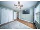 A bright bedroom featuring a ceiling fan and natural light from a window at 229 Lindy Creek Rd, Goose Creek, SC 29445