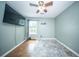 A relaxing bedroom with a ceiling fan, and natural light from a window at 229 Lindy Creek Rd, Goose Creek, SC 29445