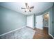 Bedroom with ceiling fan and carpet that creates a cozy atmosphere at 229 Lindy Creek Rd, Goose Creek, SC 29445