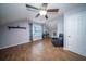 Large bonus room with hardwood floors, a ceiling fan, and a relaxing reading nook by the window at 229 Lindy Creek Rd, Goose Creek, SC 29445