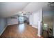 Spacious bonus room with wood floors, natural light, and a cozy seating area at 229 Lindy Creek Rd, Goose Creek, SC 29445