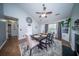 Formal dining room with neutral colors, ceiling fan, and open concept to living area at 229 Lindy Creek Rd, Goose Creek, SC 29445