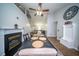 Charming dining area features wood floors, fireplace, and stylish furnishings at 229 Lindy Creek Rd, Goose Creek, SC 29445